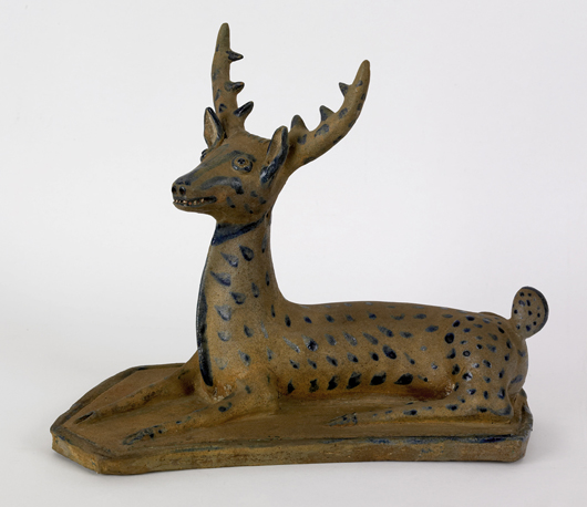 Stoneware figural examples are a rare breed. This stag, probably western Pennsylvania, circa 1875, soared to $111,150. Courtesy Pook & Pook.